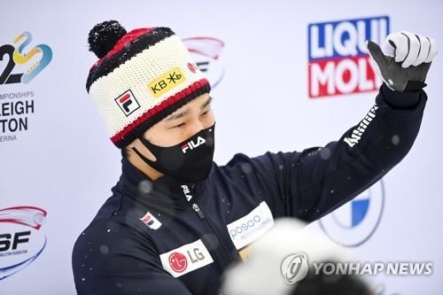Reigning Olympic skeleton champ gets bronze in his 1st race of season