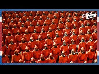 [Video] N. Korea's midnight military parade: tractors instead of missiles