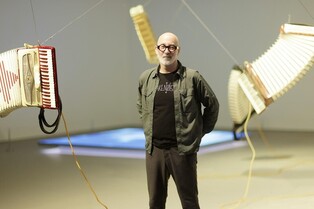 Wind-playing accordions displayed by artist Herman Kolgen says 'everything is connected to one another'