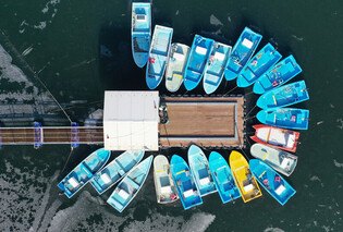 Fishing boats stuck in ice