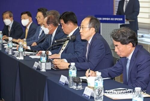 Finance chief calls for corporate restraints on 'excessive' wage increase amid inflation woes