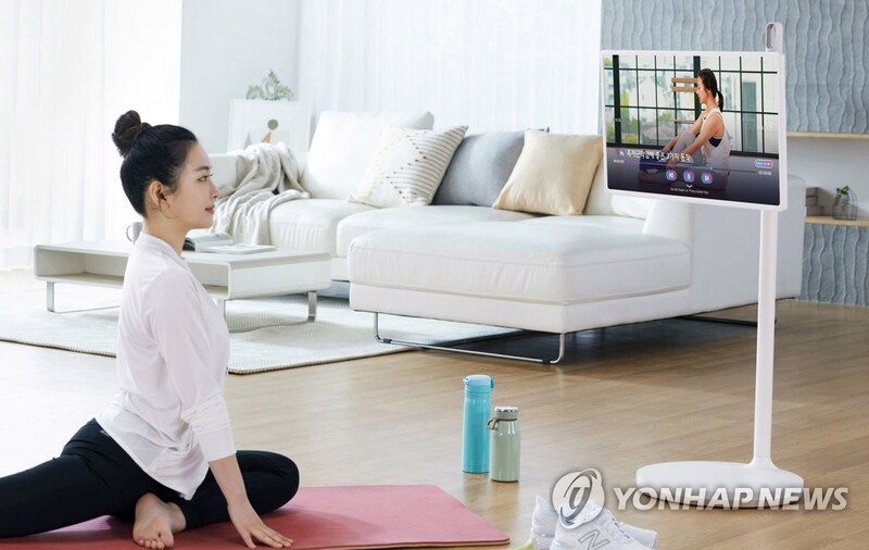 LG전자-SM, 홈 피트니스 사업 맞손…합작사 '피트니스캔디' 설립