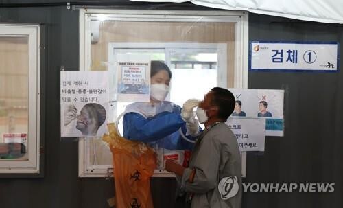 S. Korea's new COVID-19 cases slip back below 10,000