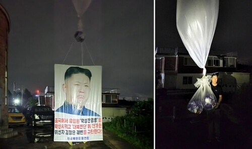Defector group says COVID-19 pain relievers, anti-Kim banners sent to North