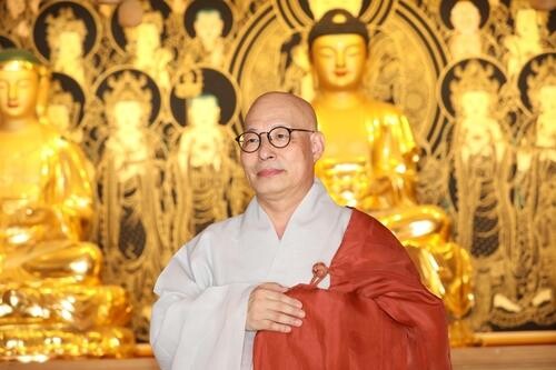Buddhist order picks new chief in uncontested election