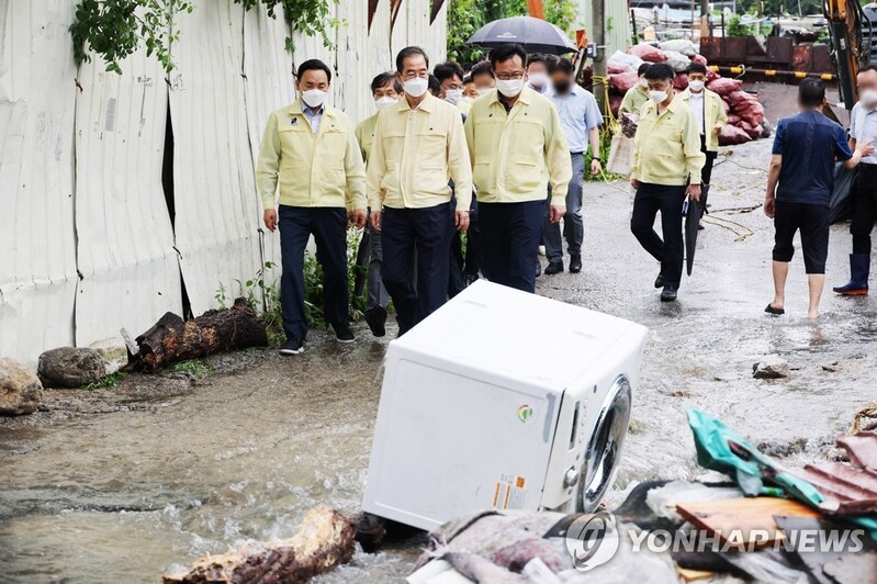 Gov't to swiftly take steps to designate rain-hit areas as special disaster zone