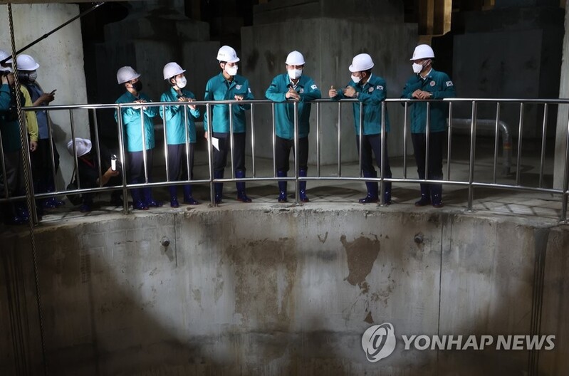Yoon visits water detention facility to review anti-flood measures