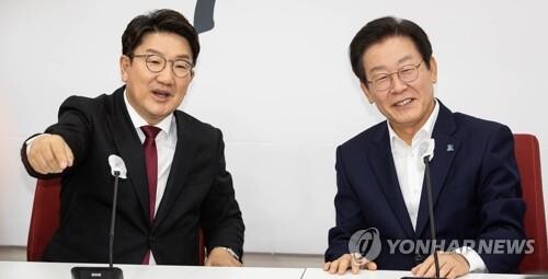 New DP leader meets with ruling party chief to discuss legislative cooperation