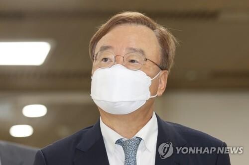 Former lawmaker given suspended prison sentence in diplomatic secret leak case