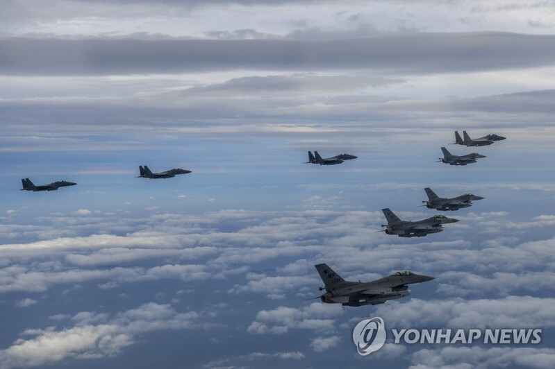 (LEAD) 12 N.K. warplanes fly in formation, apparently stage firing drills: S. Korean military