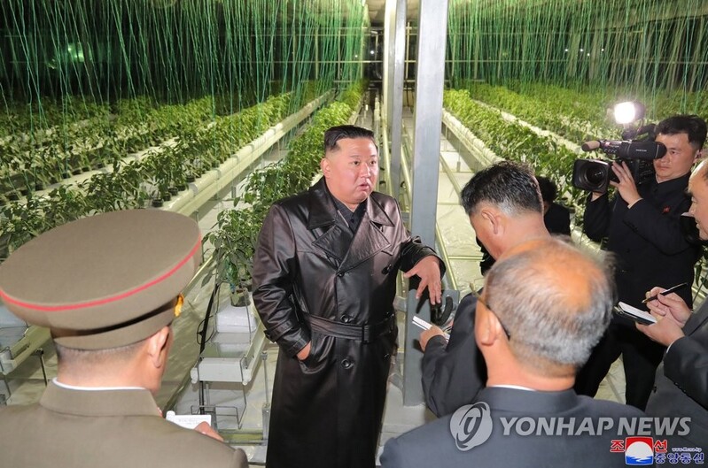 (LEAD) N.K. leader attends greenhouse farm opening ceremony on key party anniv.