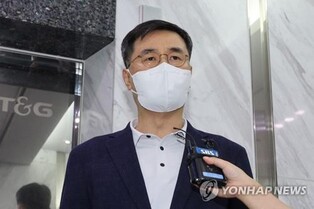 (LEAD) Air Force brigadier general demoted for mishandling sexual abuse case