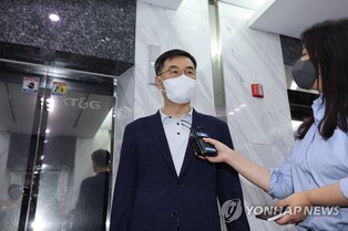 (LEAD) Demotion of Air Force brigadier general temporarily suspended