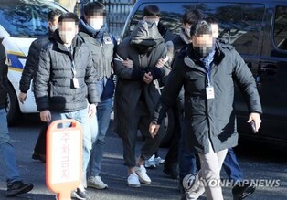 Man attends court hearing on arrest warrant for killing taxi driver, ex-girlfriend