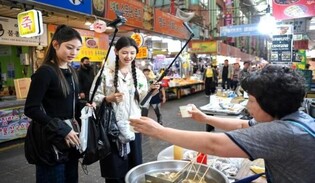 Reality variety show "NewJeans Code in Busan" gain popularity...attracting tourists