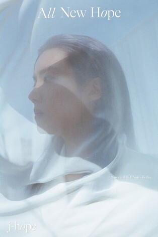 BTS' J-Hope tries long hair in photo book to be released this month