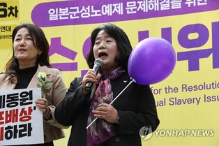 Former activist returns to sexual slavery protest following court ruling on corruption scandal