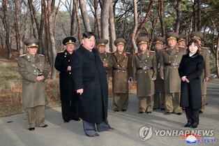 (LEAD) N. Korean leader inspects tactical guided weapons test apparently targeting S. Korean military airport: state media