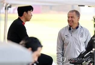 Smiles all around in S. Korean training camp for friendlies