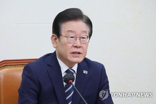 Opposition leader strongly condemns Japan over textbook row