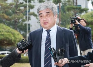 (LEAD) Broadcasting watchdog chief attends court hearing on arrest warrant