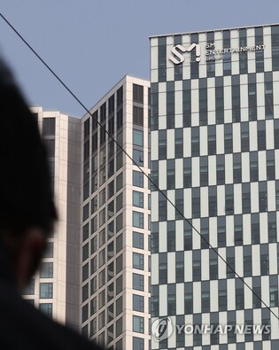 SM 3.0 officially starts...Lee Soo-man missing from ONEW and KAI's album credit