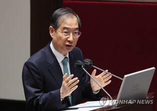 PM urges full gov't measures over forecast of heavy rains