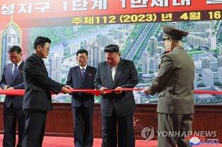 (LEAD) N. Korean leader celebrates completion of building more new homes in Pyongyang