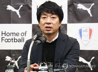 New coach for last-place football club seeks gradual changes