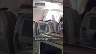 Asiana Airlines plane's door opens in mid-flight