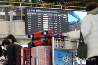 Hong Konger sentenced to 1 1/2 years in prison for beating airport workers