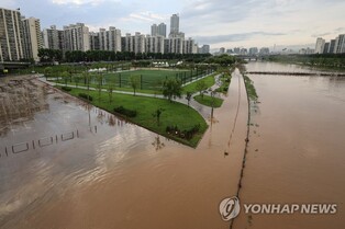 (LEAD) Heavy rain forecast to return this week after downpours leave one missing, scores evacuated