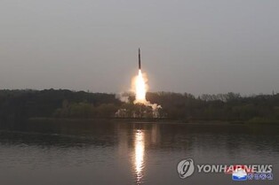 (4th LD) N. Korea fires ICBM, raises tensions after U.S. spy plane accusations