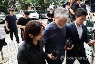 Operator of online trading community arrested on stock manipulation charges