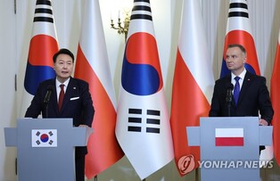 (LEAD) Yoon says S. Korea, Poland are 'optimal partners' for Ukraine reconstruction