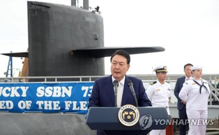 Yoon boards U.S. nuclear-capable submarine in show of force against N. Korea