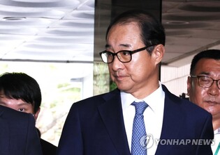 2 DP lawmakers attend court hearings on arrest warrants over cash-for-votes scandal