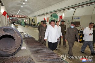 N. Korean leader visits navy unit, guides cruise missile test