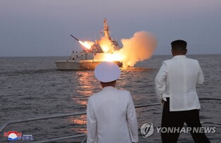(3rd LD) N. Korean leader visits navy unit, inspects cruise missile test aboard warship