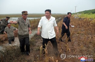 N. Korea's Kim scolds premier over 'irresponsible' attitude while inspecting flooded area