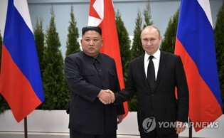 (LEAD) N. Korean leader to 'soon' visit Russia for talks with Putin: KCNA