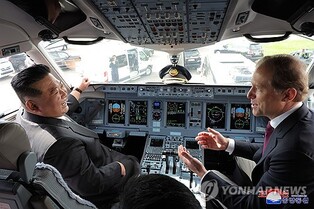(3rd LD) N. Korea's Kim meets Russian defense minister, inspects nuclear-capable bombers