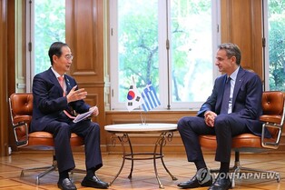 PM visits Greece for talks on cooperation, World Expo bid campaign