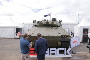 (LEAD) Defense chief offers support for signing of Australia's armored vehicle acquisition deal