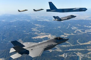 (LEAD) S. Korea, U.S. stage joint air drills with B-52H bombers over Yellow Sea