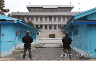 N. Korean soldiers in truce village armed with pistols: sources