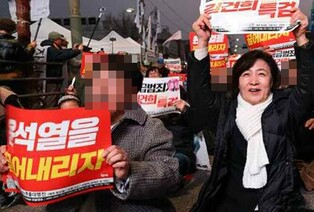N. Korean newspaper carries photo of ex-minister in coverage of anti-gov't rally in Seoul
