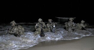 Navy special warfare forces conduct wintertime training