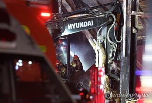 (2nd LD) 2 firefighters found dead in meat factory fire