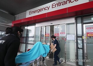 Military hospital emergency rooms open doors to public as doctors walk out